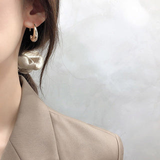 Micara - Curvy Hoops - Ohrringe - Ohrringe - Silber - Müller Mode