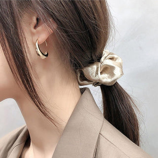 Micara - Curvy Hoops - Ohrringe - Ohrringe - Silber - Müller Mode