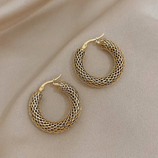 Micara - Ein Geflecht aus Eleganz - Ohrringe - Gold - Müller Mode