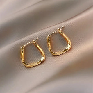 Micara - Shimmer Arch - Ohrringe - Ohrringe - Gold - Müller Mode